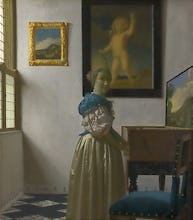 A Young Woman standing at a Virginal