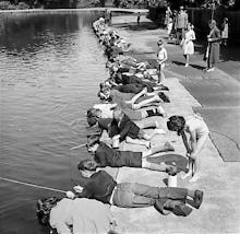 Children fishing in Victoria Park, London 1953