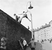 Climbing the wall, Oval cricket ground 1953