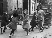 Dancing to a barrel organ, London 1941