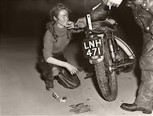 Girl with Triumph and roll-up