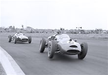 Graham Hill in pursuit, Silverstone