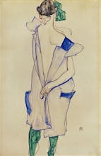 Standing girl in blue dress and green stockings, back view, 1913