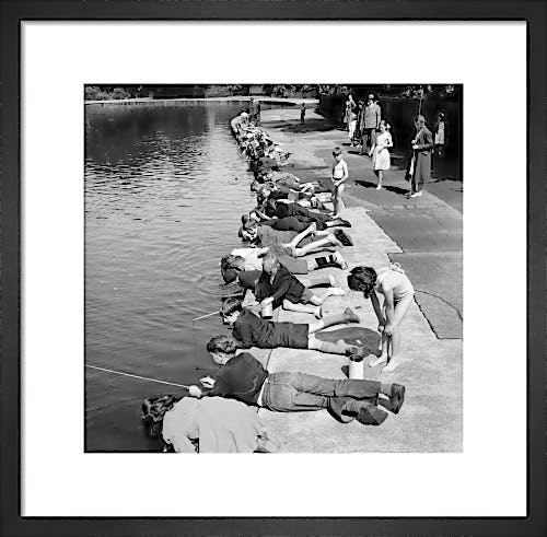 Children fishing in Victoria Park, London 1953 by Mirrorpix