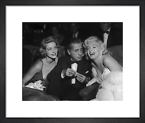Marilyn Monroe with Humphrey Bogart and Lauren Bacall at Ciro's Nightclub by Hollywood Photo Archive