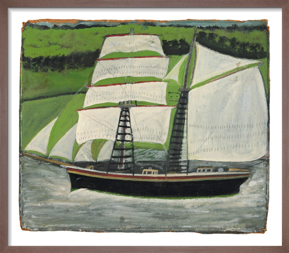 Brigantine sailing past green fields