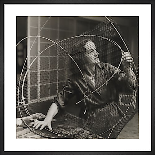 Barbara Hepworth at work on the armature of a sculpture, 1961 by Ida Kar