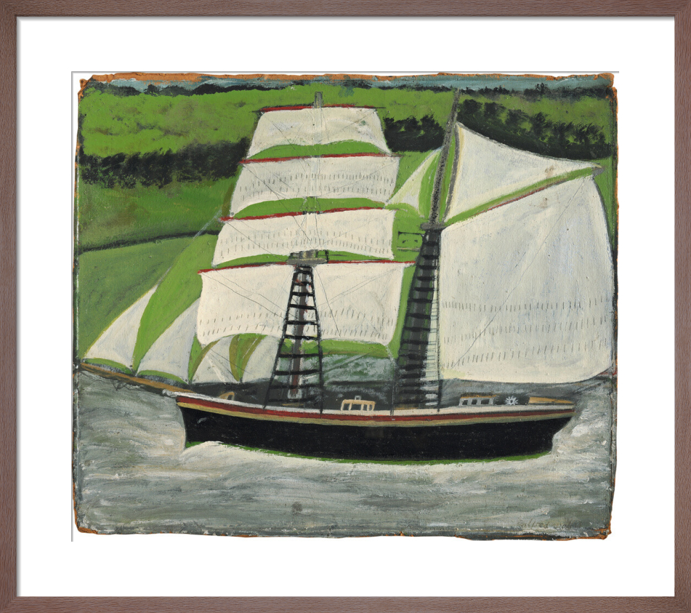 Brigantine sailing past green fields